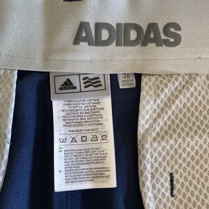 Never worn Adidas navy athletic shorts size 36
